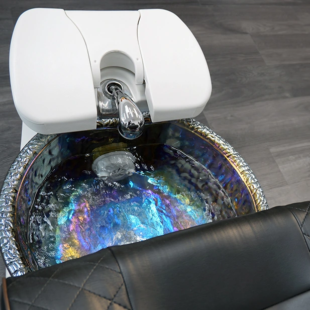 Spa pedicure chair with a pearlescent foot basin.