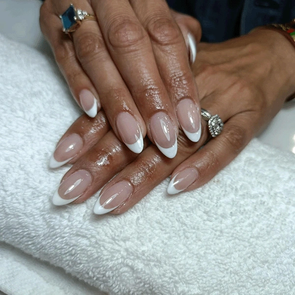 Almond nails with a classic white French tip.